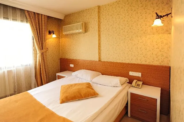غرفة مفردة بسرير مزدوج، Üstün Otel Alsancak 1/2