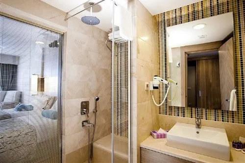 Room, Double Bed, Lateral Side Sea View، Melas Resort Hotel Side 1/1