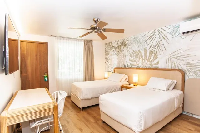 جناح جونيور بسرير مزدوج بإطلالة على الحديقة، Hotel Cocoplum Beach 1/5