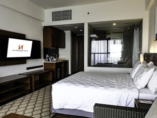 غرفة غراند ديلوكس بسرير كوين، Swiss-Belresort Dago Heritage 1/5
