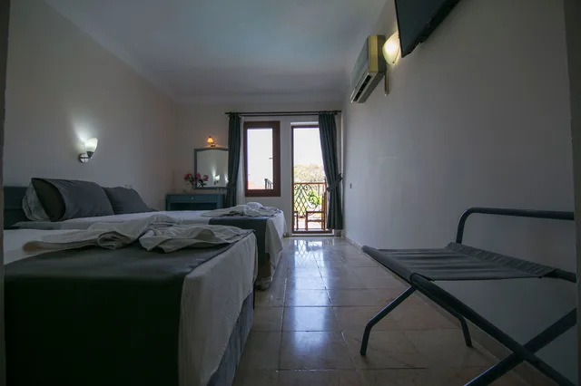 غرفة قياسية ثلاثية بسرير كوين وسرير فردي، Kilim Hotel 7/10