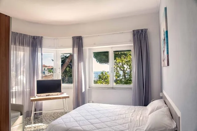 غرفة رباعية بسرير كوين وسرير بطابقين، Hotel Costa Verde 3/3