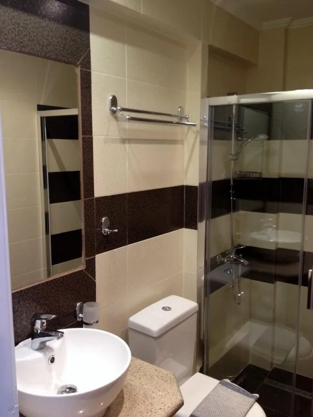 شقة عائلية بسريرين منفصلين بغرفة نوم واحدة مع أريكة، Oasis Apartments 10/10