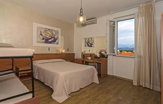 غرفة عائلية رباعية بأربعة أسرّة، Biagi Hotel 4/10