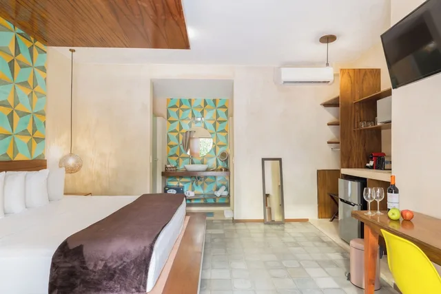 غرفة فاخرة بسرير كينج بجاكوزي، Quinta Margarita Suites 5/7