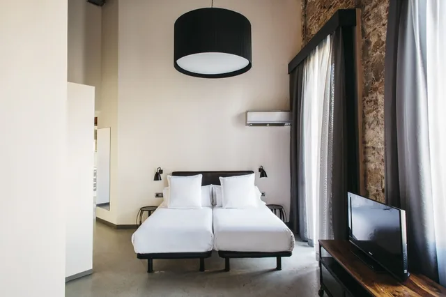 غرفة ديلوكس عائلية بأربعة أسرّة مع أريكة، Barcelona Apartment Republica 2/4