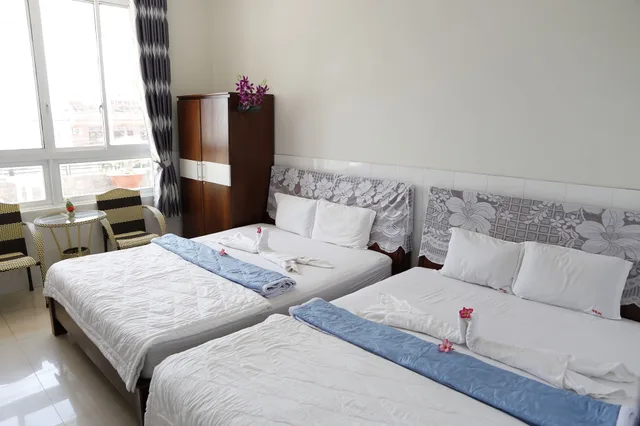 غرفة رباعية بسريرين مزدوجين، Minh Hung Hotel 4/8