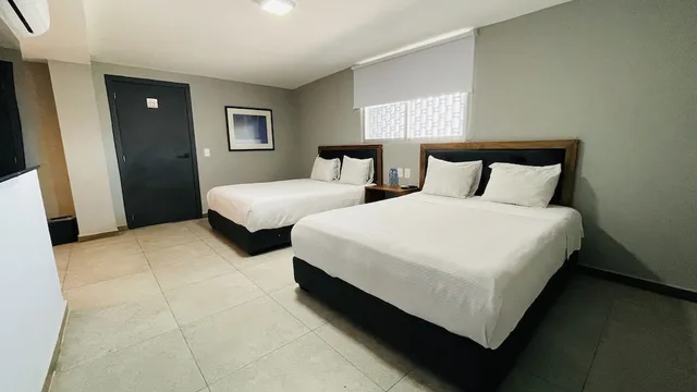 غرفة رباعية بسريرين مزدوجين، Hit Merida Hotel Boutique 1/4