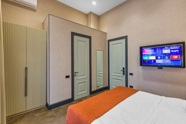 غرفة فاخرة بسرير كينج بإطلالة على المتنزه للمدخنين، Nizami Central Park Hotel 2/3