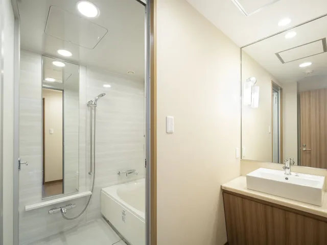 غرفة يابانية غربية ديلوكس بسريرين منفصلين وفرشتي فوتون مع أريكة، Irago Ocean Resort 2/2