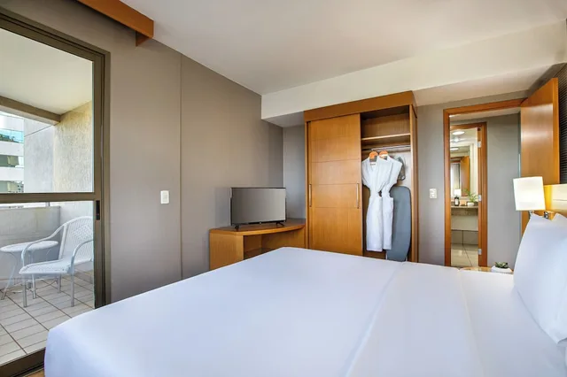 غرفة بريميوم بسرير كينج وسرير كوين مع أريكة، Brasil 21 Suites Affiliated by Melia 3/10