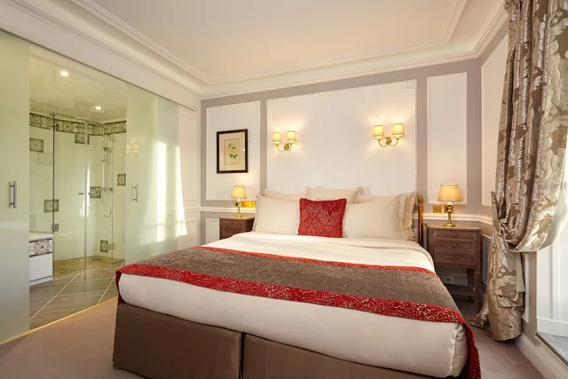 جناح جونيور بسرير كينج مع أريكة، Hotel Regina Louvre 1/2