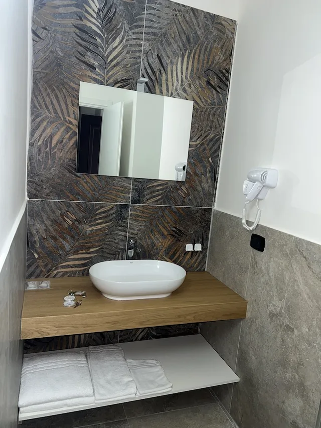 غرفة غراند ثلاثية بثلاثة أسرّة، Barbato Hotel 6/7