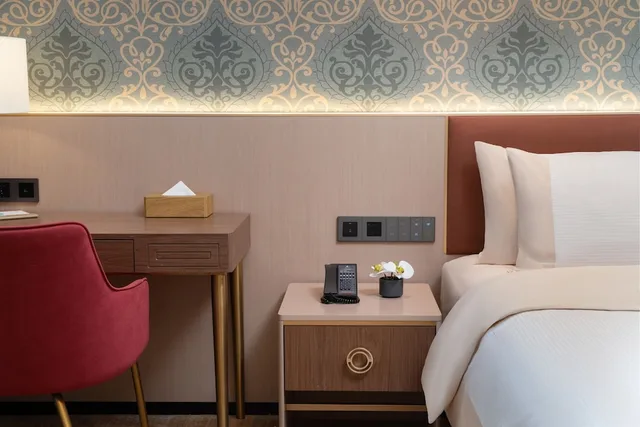 غرفة بريميوم بسرير كينج وسرير كوين، Guangzhou Wogo Yuanbao Hotel (Zhujiang New Town) 2/3