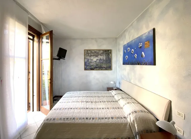 شقة بسرير بطابقين وسرير كوين بغرفتي نوم مع أريكة، Residence Garda Resort 4/8