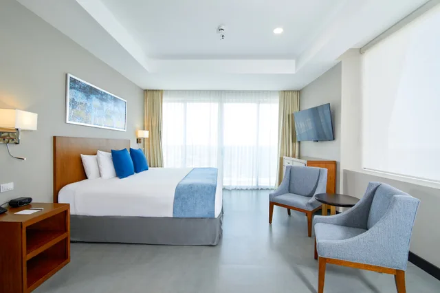 جناح ديلوكس بسرير كينج، Wyndham Manta Sail Plaza Hotel and Convention Center 2/5