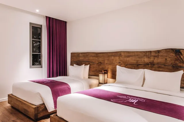 غرفة بريميوم ثلاثية بسرير كينج وسرير فردي، JM Boutique Hotel 2/4