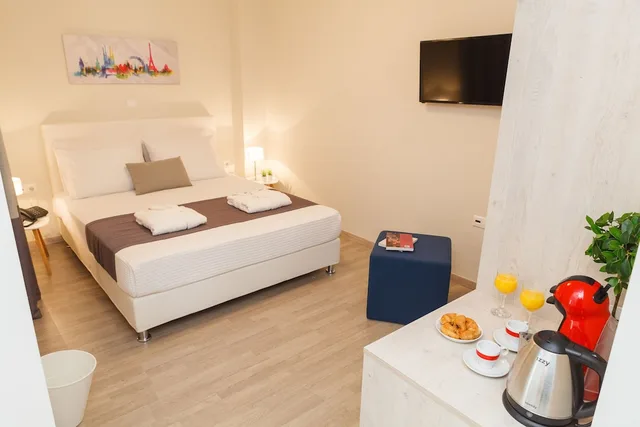 غرفة بريميوم بسرير كوين، Tins Hotel City 1/6