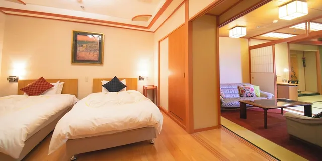 غرفة فاخرة بسريرين منفصلين وفرشتي فوتون بغرفتي نوم للمدخنين، Iwakuni Kokusai Kanko Hotel 1/3