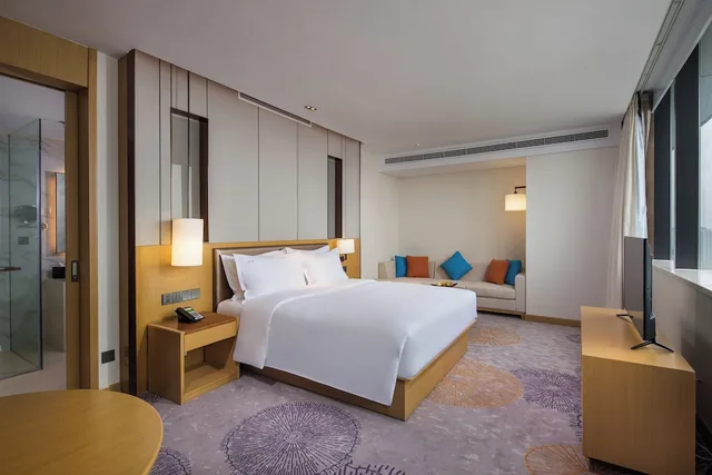 غرفة بريميوم بسرير كينج مع دخول صالة النادي مع دخول الصالة، Holiday Inn Tianjin Xiqing 2/3