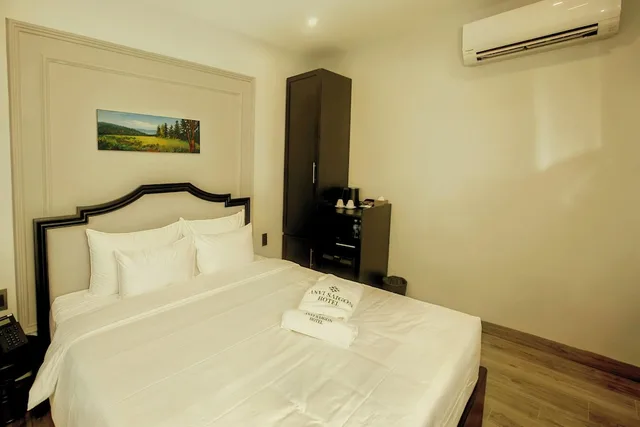 غرفة ديلوكس بسرير كوين، Anvi Saigon Boutique Hotel 2/9