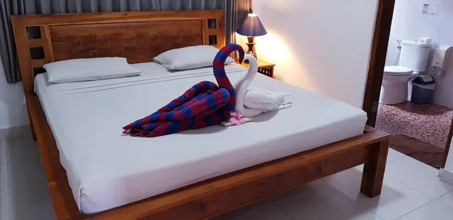 غرفة عائلية بسريرين كوين مع أريكة، Kusnadi Hotel 4/6