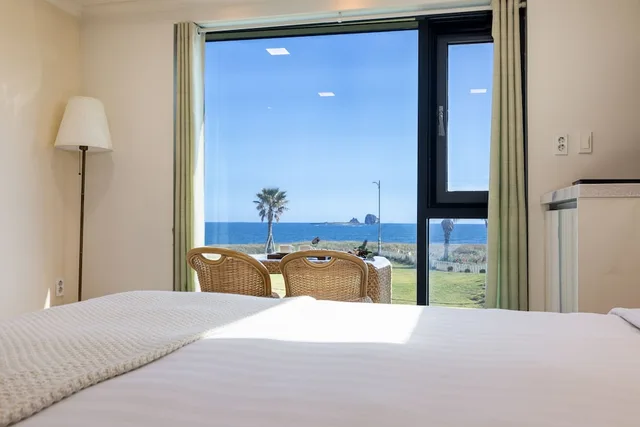 غرفة بسرير كوين بإطلالة على البحر بجاكوزي، Sun And Moon Resort 3/5