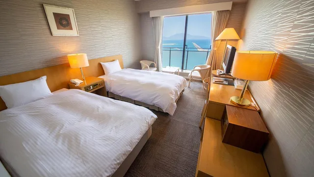 غرفة غربية بسريرين منفصلين بإطلالة على البحر، Kokumin Shukusha Marine Terrace Ashiya 1/1