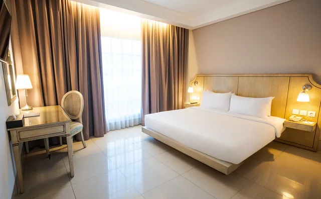 غرفة ديلوكس بسرير كينج، NIMS Hotel Seminyak 1/5