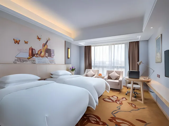 غرفة بزنس بسريرين منفصلين، Vienna International Hotel (Haimen Railway Station) 1/1