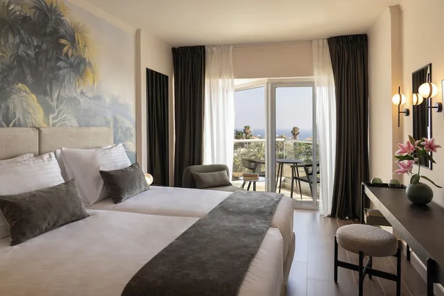 غرفة سوبيريور بسريرين منفصلين بإطلالة جزئية على البحر، Cali Resort & Spa - Adults Only 1/4