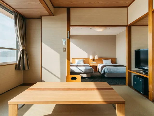 Semi Room, Japanese Western, 2 Semi Double Beds, 2 Futon Beds, Private Bathroom، KAMENOI HOTEL Kii-Tanabe 1/2