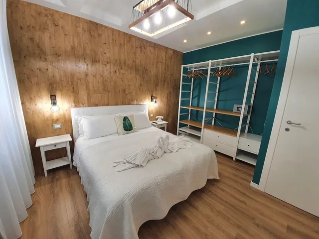 شقة ديلوكس بسرير كوين وسرير بطابقين بغرفتي نوم، Residence Eleonora 1/2