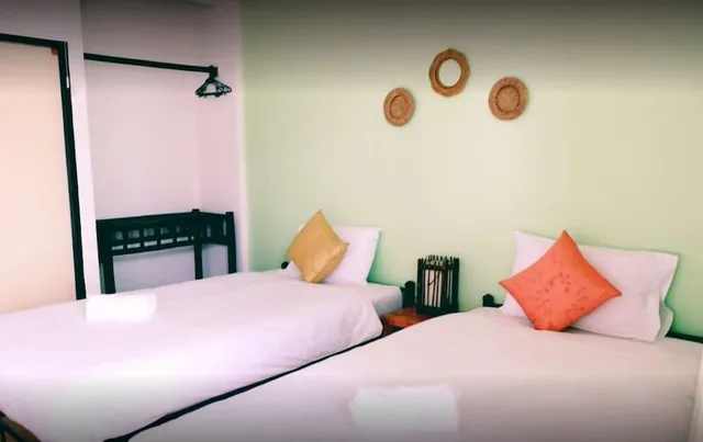 غرفة عائلية بسرير مزدوج وسريرين منفصلين بحمام خاص، Yen Aura Boutique Hotel 1/2