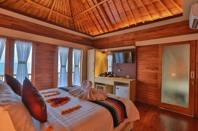 كوخ ديلوكس بسرير كينج بإطلالة على البحر بشرفة، Sunrise Cottage Nusa Penida 3/3