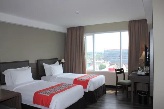 غرفة ديلوكس بسريرين منفصلين، Swiss-Belhotel Pangkalpinang 1/3