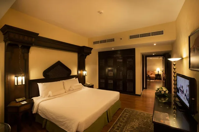1 Bedroom, Suite, King Bed, Arabian Courtyard Hotel & Spa 2/4