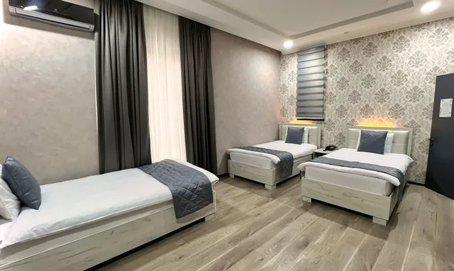 غرفة عائلية ثلاثية، ASTER HOTEL GROUP 1/2