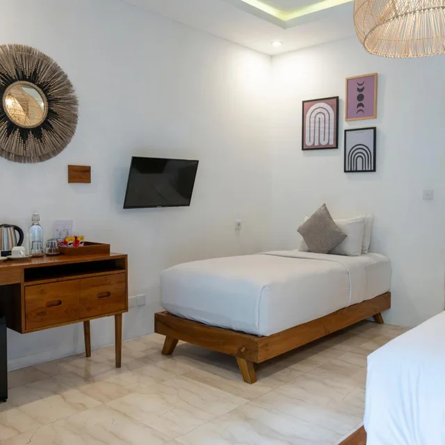 غرفة ديلوكس ثلاثية بسرير فردي، Tamantara Suites & Villa by ZUZU 4/9