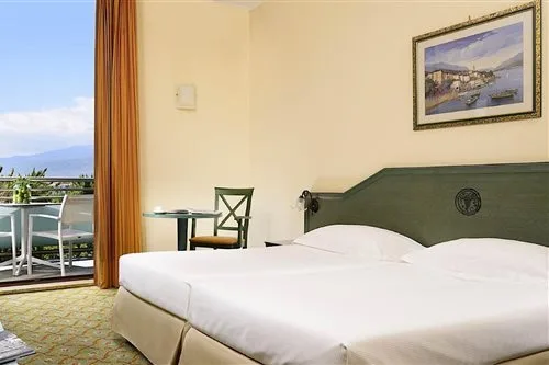 غرفة كلاسيكية بسرير مزدوج أو سريرين منفصلين، Unahotels Naxos Beach Sicilia 1/3