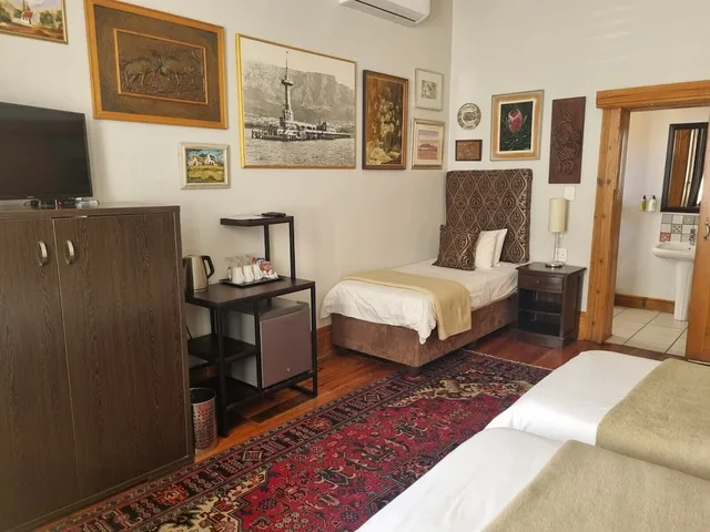 غرفة ديلوكس ثلاثية بثلاثة أسرّة، Ashanti Guest House Gardens Hostel 6/10