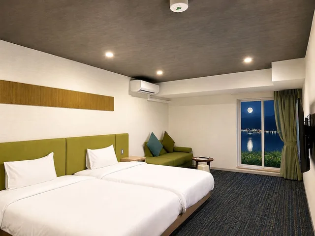 غرفة قياسية بسريرين منفصلين بإطلالة على البحيرة، Hotel Cocoa 1/10