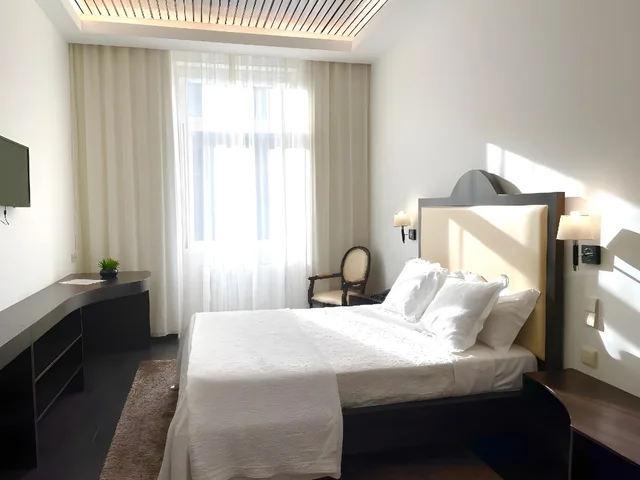 غرفة سوبيريور بسريرين مزدوجين بإطلالة على المدينة، Universal Hotel 1/2