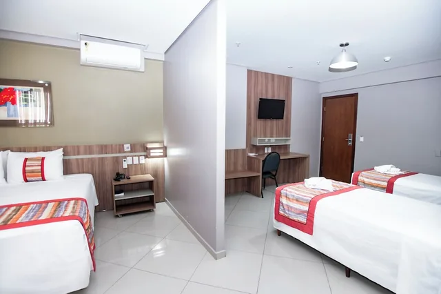 غرفة عائلية بسرير مزدوج وسريرين منفصلين، PAIAGUAS PALACE HOTEL 4/10
