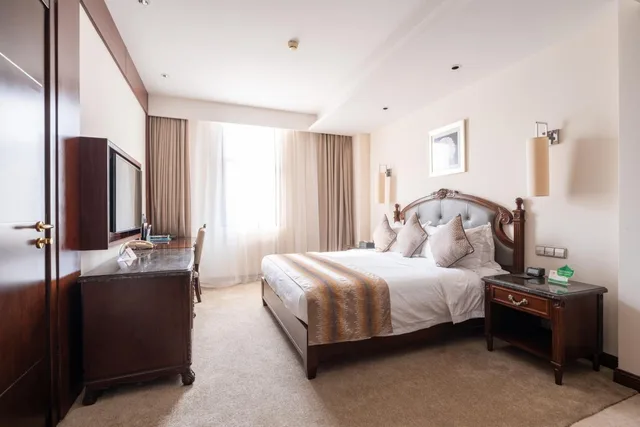 جناح جونيور بسرير كينج، Tang Palace Hotel 3/4