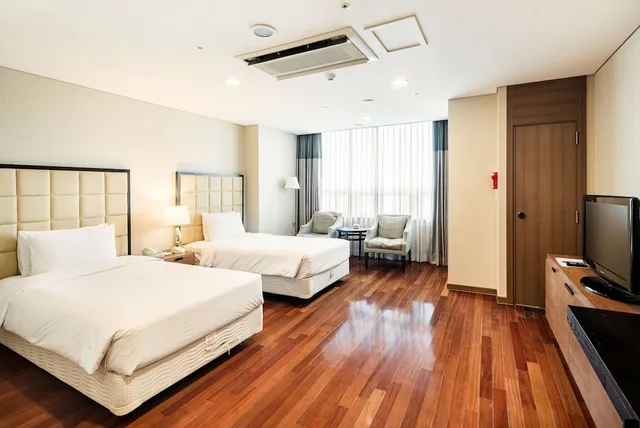 غرفة ديلوكس اقتصادية بسريرين منفصلين، Ramada Hotel & Suites by Wyndham Seoul Namdaemun 1/7