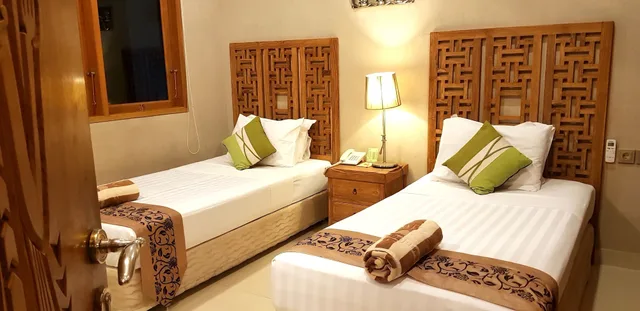 جناح بسرير مزدوج وسريرين منفصلين بغرفتي نوم، Puri Dajuma Beach Eco Resort & Spa 3/4