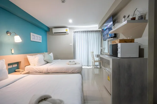 غرفة عائلية بسريرين مزدوجين، V-Ocean Palace Hat Yai 1/2