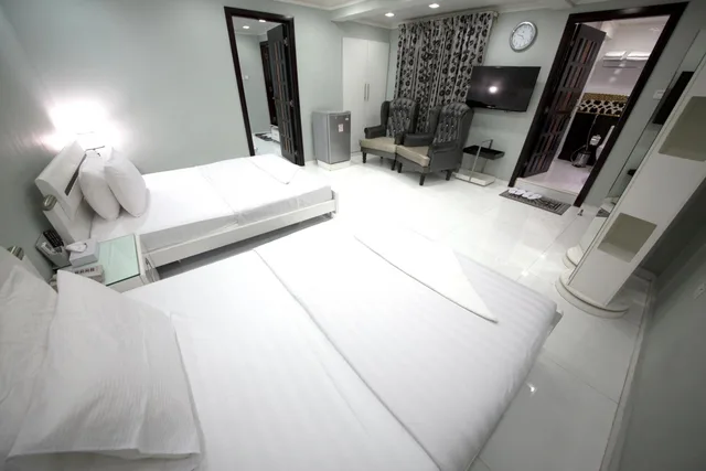 غرفة متصلة بسرير كينج وسريرين منفصلين، White Fort Hotel 1/3