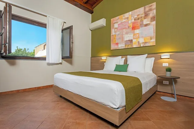 غرفة كلاسيكية بسرير كينج بإطلالة على الحديقة، Feudogrande Agriturismo 1/6